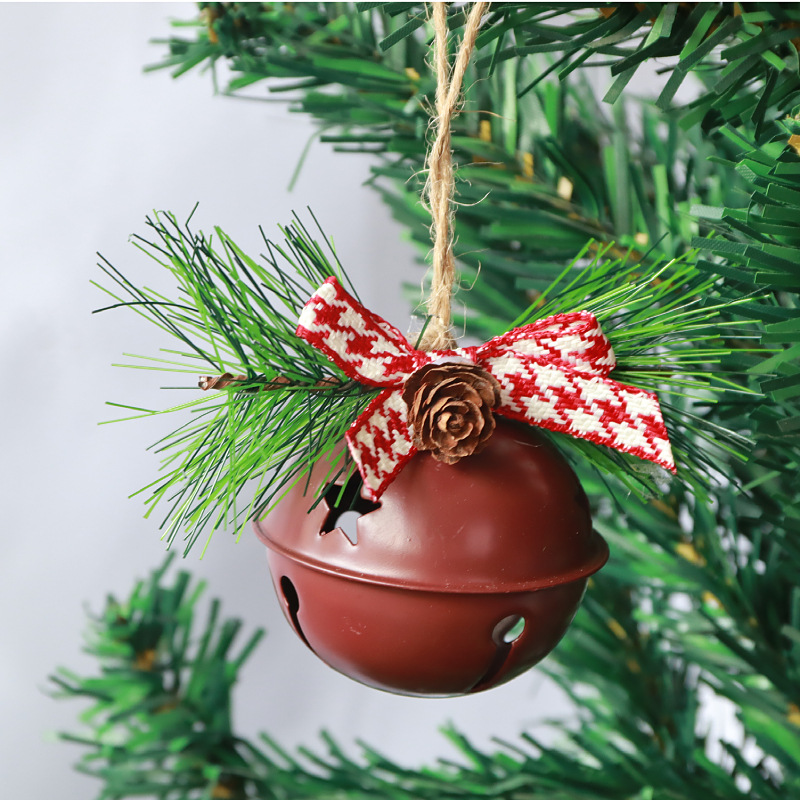Campanella rosso vino con fiocco rosso e bianco.