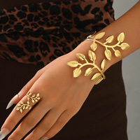 Ensemble de bijoux ajustables plaqué or et argent pour femme, avec bracelet ouvert et bague, motif feuille exagéré, style chunky, idéal pour les fêtes