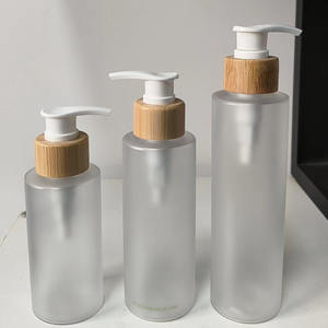 Nuevo estilo de lujo 150ml 200ml 250ml Cierre de bambú vacío esmerilado champú loción bomba PET botella para cosméticos - Product Image 1
