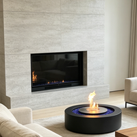 Cheminée à alcool ronde haut de gamme, foyer artistique à flamme réelle avec contrôle de la flamme pour penthouse, salon ou zone de réception