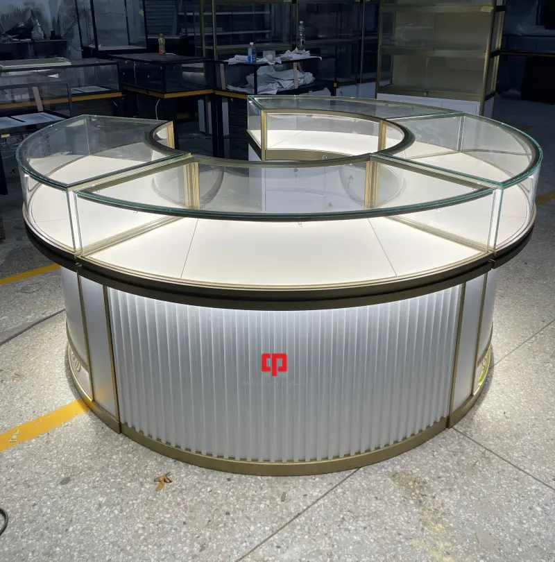 Luxury glass sales counter booth round metal stainless steel jewelry display cabinet factory manufacturer