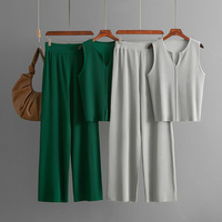 Ensemble décontracté d'été deux pièces pour femme : Haut tricoté sans manches à col rond et pantalon large, motif uni, ensemble pull tendance