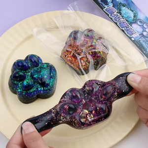 Juguetes Sensoriales Kawaii de PVC con Forma de Pata de Gato Galaxy, Juguetes Antiestrés para Niños, para Apretar y Divertirse en Familia, para Niños y Niñas - Product Image 1