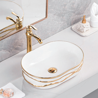 Lavabo de salle de bain en céramique de luxe de forme ovale, design artisanal, finition électrolytique multicolore, lavabo de table