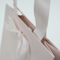 Vente directe d'usine personnalisez votre propre logo de marque biodégradable portable rose bijoux de luxe sac à provisions avec nœud