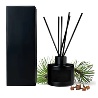 Bouteille vide de diffuseur à roseaux de luxe en gros 50ml 100ml, conteneur décoratif cylindrique en verre noir avec couvercle et sérigraphie