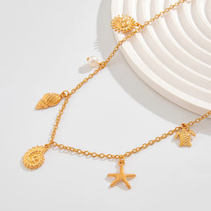 Chaîne de corps et de taille pour femme en acier inoxydable plaqué or, style océanique, avec pendentifs étoile de mer et conque, motif 'Returnee' - Product Image 4