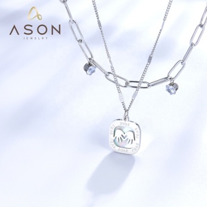Collier en acier inoxydable à double chaîne avec accessoires en coquille blanche double paume et quatre diamants - Product Image 1