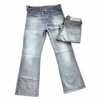 Jeans de Hombre Estilo Coreano Vintage 2026, Cintura Media, Mezclilla Ecológica con Diseños de Agujeros, ODM