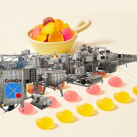 Machine automatique de grande capacité à sourire bonbons sucette caramel au caramel Jelly Gummy ligne de dépôt de bonbons mous