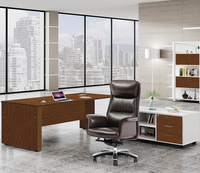 Chaise de bureau exécutive de luxe contemporaine en cuir véritable avec dossier en maille, pivotant à 360° et réglable en hauteur
