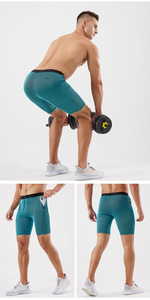 2025 nueva llegada <span class=keywords><strong>mallas</strong></span> Unisex para correr con bolsillo de cintura alta patrón sólido pantalones cortos de compresión ropa interior pantalones cortos deportivos ajustados - Product Image 4