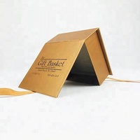 Boîte cadeau pliable haut de gamme en carton recyclé écologique avec ruban et design protecteur en feuille d'or