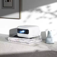 Nuevo diseño HD Home Theater 4K Proyector láser de largo alcance 1200 lúmenes 3D Triple láser 2 + 32GB Mini proyector portátil
