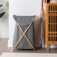 Panier à linge pliable en tissu cationique avec cadre en bambou de style nordique écologique en forme de X, avec couvercle