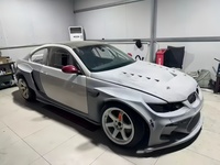 Kit carrosserie large pour BMW E92 : pare-chocs avant et arrière, ailes, capot, jupes latérales, spoiler