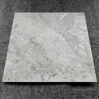 Carreaux de sol en marbre gris rustique émaillé antidérapant de qualité supérieure pour salon et salle de bain, best-seller de Foshan, 60x60 600x600