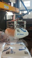 Machine d'ouverture automatique de sacs avec bras robotique, station de dépalettisation et de déballage de sacs, pour sacs de 25 à 100 kg, capacité de 80 à 120 sacs/h
