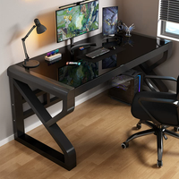 Bureau de jeu moderne en gros avec plateau en verre trempé, bureau d'ordinateur noir à pieds en K pour la maison et le bureau, prix d'usine