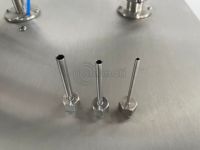 Machine de remplissage de haute précision à pompe à engrenages servo à tête unique avec plage de remplissage illimitée pour la production de pâtes cosmétiques