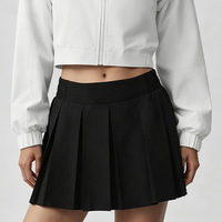 Veste de sport transfrontalière unie à manches longues, coupe courte, avec ouverture dorsale, respirante, séchage rapide, taille élastique, plissée, taille mi-haute, pour le tennis