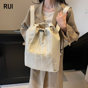 Sac à dos de sport décontracté minimaliste pour femme RUIQUWIN, sac à main zippé multifonctionnel, imperméable, léger, 22L, pour voyage - Product Image 1