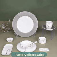 Service de table haut de gamme en porcelaine fine de style chinois, motif encre de Chine, bordure argentée, élégant et sophistiqué, pour fêtes et hôtels
