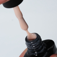 Base de constructeur en caoutchouc nu Vernis à ongles en gel UV Marque privée Couleur personnalisée Flocons de feuille d'or brillante Base en caoutchouc Vernis à ongles en gel Couche de base