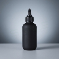 Bouteille souple personnalisée en LDPE noir de 120 ml (4 oz) avec col 24/410, finition mate ou brillante, avec bouchon applicateur pour huile capillaire et coloration