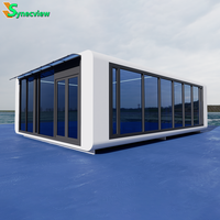Maison préfabriquée de luxe de 20 pieds 40 pieds avec 2 chambres à coucher Maison modulaire en acier léger Cuisine Design en verre Maison à capsule capsule pour villa de luxe