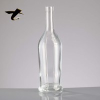 Bouteille de tequila en verre cylindrique de 700 ml avec logo personnalisé, design doré estampé à chaud, base lourde, bouteille de liqueur haut de gamme, prête à diffuser
