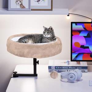 Venta al por mayor moderna de plástico pequeña mascota Mesa cama 360 rotación gato nido altura ajustable escritorio gato hamaca para oficina - Product Image 1