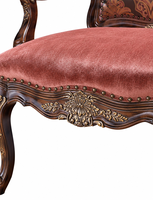 Fauteuil Chesterfield antique en cuir marron capitonné, avec garniture à clous et assise en tapisserie, pieds tournés