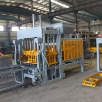Machine de production de briques entièrement automatique QT8-15 pour blocs de béton et bordures de routes