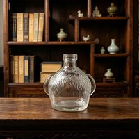 Bouteille de vin en verre sculpté personnalisable en usine avec bouchon en liège et emballage en carton pour bouteilles de spiritueux modernes de luxe