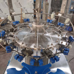 Máquina automática de lavado y llenado de botellas de vidrio con cubierta de aluminio a pequeña escala - Product Image 3