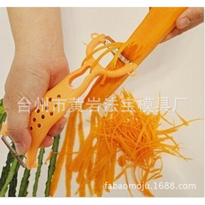 Pelador de Frutas y Verduras de Plástico con Cuchilla de Acero Inoxidable y Molde Multicavidad para Uso en la Cocina - Product Image 1