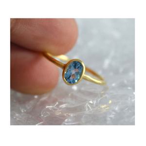 Anillo de Oro Amarillo de 14k con Topacio Azul Cielo Natural Ovalado de 5x7mm, Fabricante de Joyería - Product Image 5