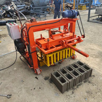 Petite machine à fabriquer des blocs de béton manuelle portable, machine à fabriquer des briques creuses à vendre