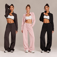Ensemble trois pièces personnalisé OEM ODM pour femme : veste courte zippée à col montant, pantalon large à taille haute avec cordon de serrage, survêtement sportif