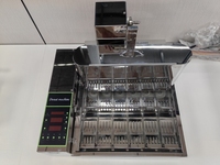 Mini machine à beignets à six rangées, type électrique automatique avec écran numérique, machine à faire des mini beignets en stock, mini fabricant de beignets