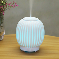 Humidificateur d'air intelligent en céramique à prix d'usine, diffuseur d'huiles essentielles d'aromathérapie, humidificateur domestique à brume froide et lumière