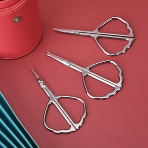 Tijeras de maquillaje de alta calidad, forma de concha, acero inoxidable, tijeras para el cabello, tijeras para el cuidado de las cejas - Product Image 1