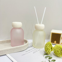 Bouteille en verre vide ronde personnalisée de 100 ml pour diffuseur d'arômes, bouteille de diffuseur d'huiles essentielles