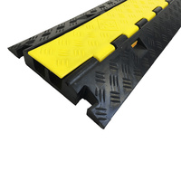 Protector de Cables de PVC Amarillo y Negro para Exteriores, Resistente a la Presión, de 2 Canales, Reductor de Velocidad de 10-15 mph para Instalación en Concreto