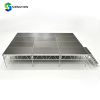Plateforme de scène en aluminium imperméable à plusieurs niveaux avec structure en treillis pour concerts en plein air, spectacles, festivals et événements