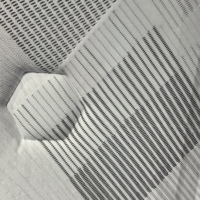Tissu jacquard noir moderne à rayures en polyester, matière douce et respirante pour literie, tissu tricoté pour matelas.