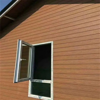 Revêtement mural extérieur en bois composite WPC aspect maison en vinyle