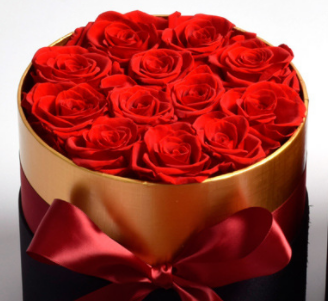 Scatola rotonda con 19 rose