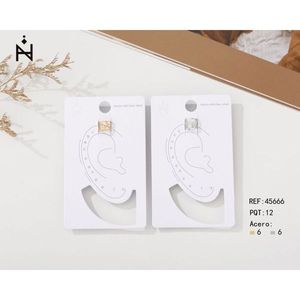 Orecchini a clip a forma di X in acciaio inossidabile, gioielli unisex alla moda - Product Image 1